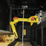 Custom Robot-On-Rail Blasting and Shot Peening System for Aerospace Industry